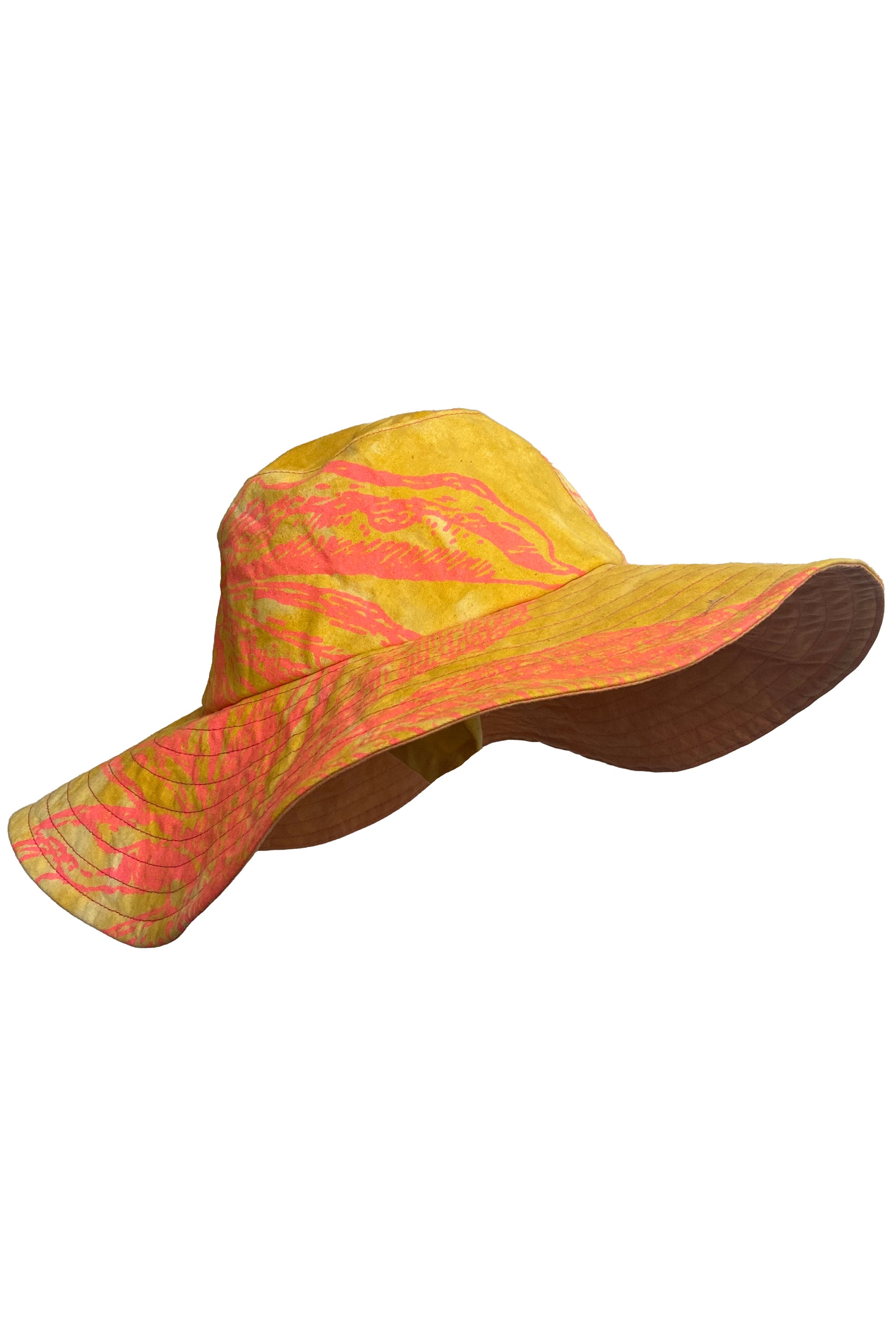 Handcrafted sun hat with a flexible, packable structure and bold fabric prints.