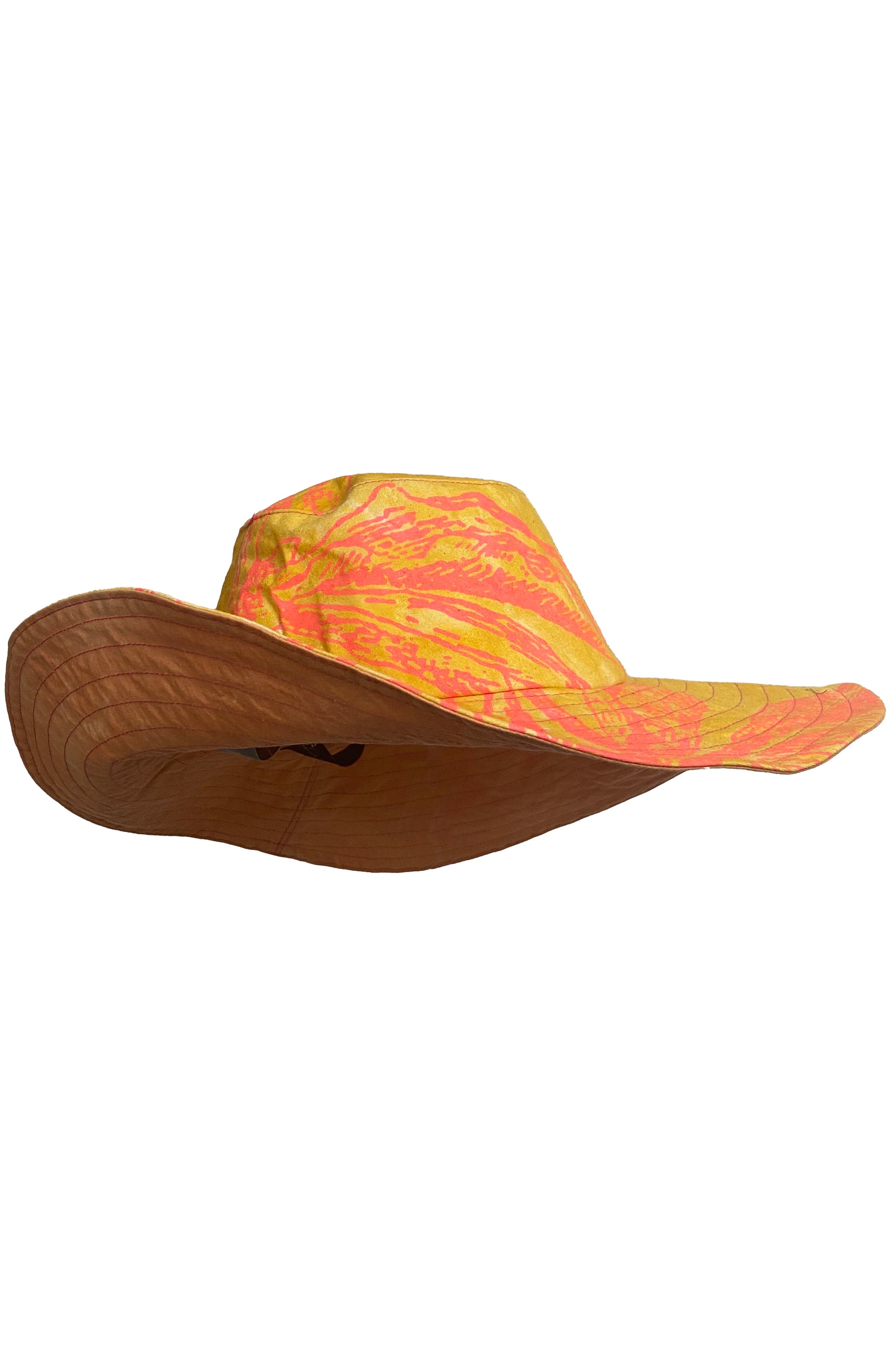 Handcrafted sun hat with a flexible, packable structure and bold fabric prints.