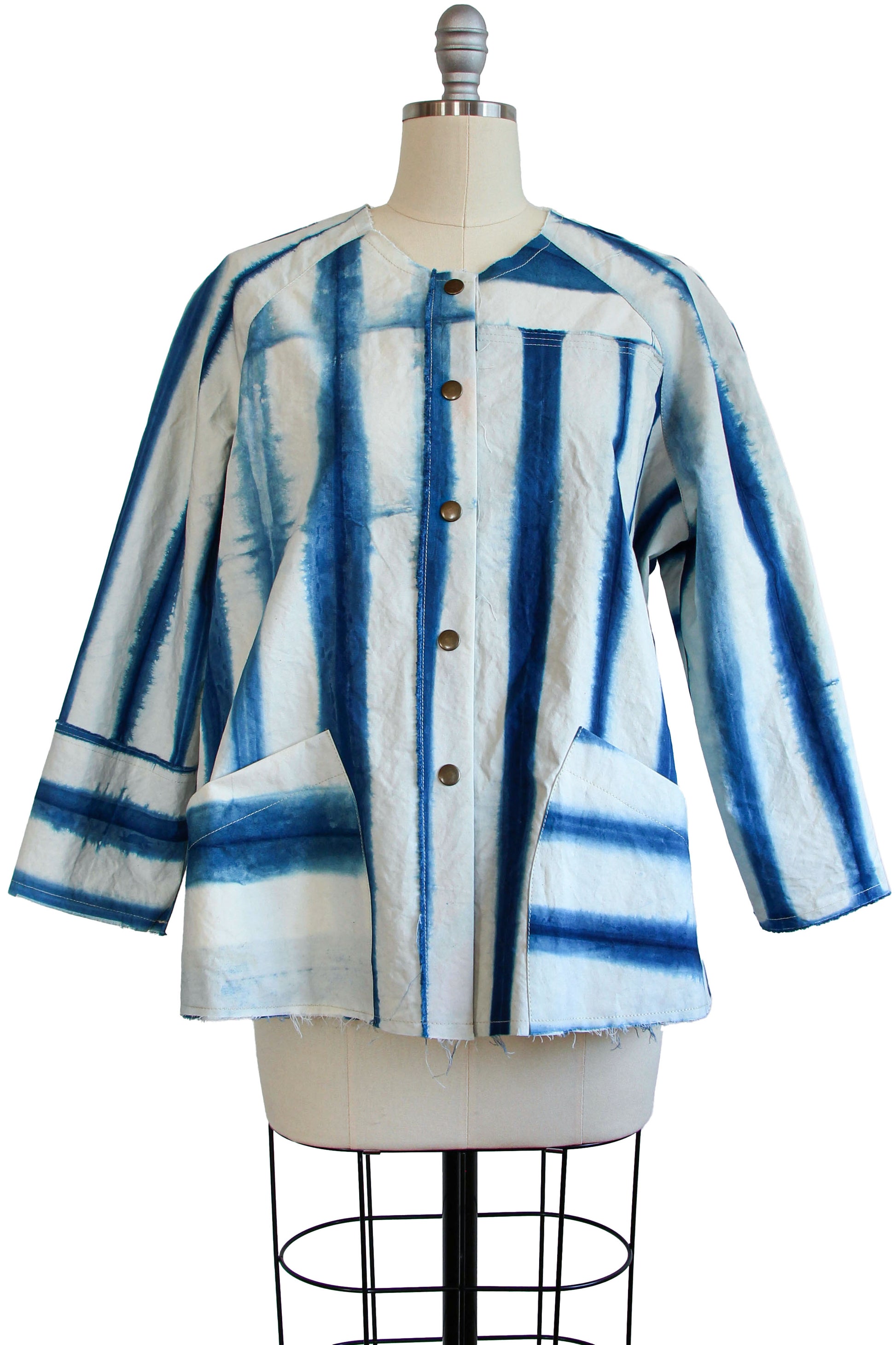 Versatile layering jacket with artisanal dyeing techniques and deep pockets.