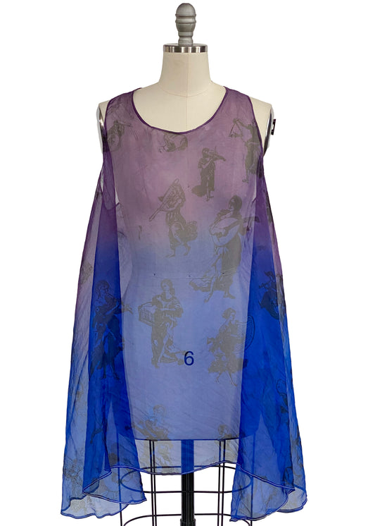 Handcrafted apron dress with crisscross back, practical silhouette, and an adjustable open design for comfort and movement.